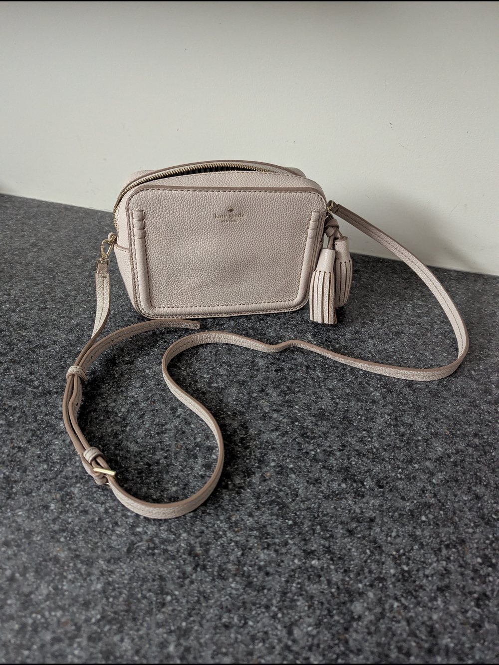 kate spade Pebbled Leather Crossbody in Light Beige with Tassel Charm